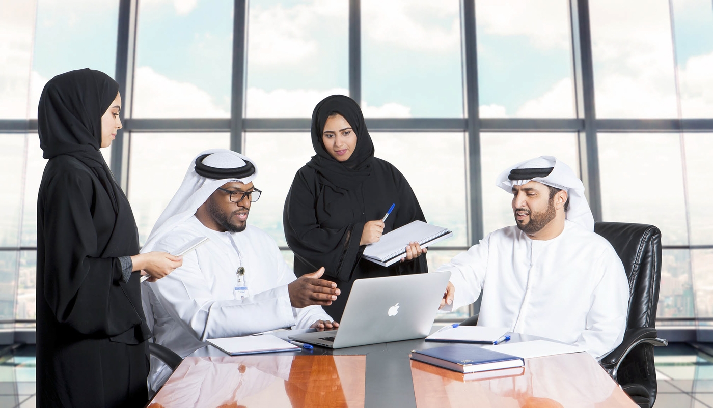 A team of dedicated professionals working together in an office setting.
